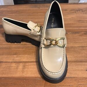 Nine West cream color patent leather loafers, gold color chain embellishment